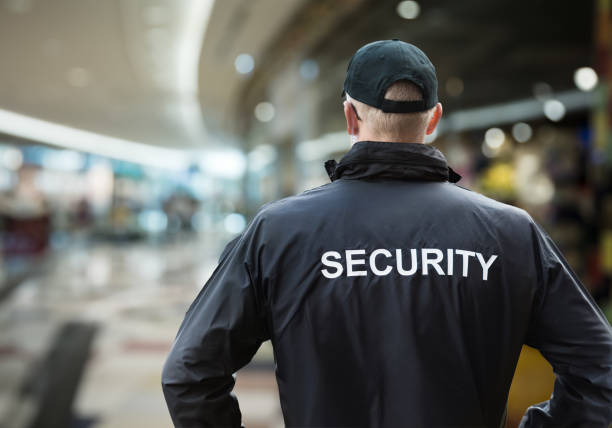 security man looking at moscow kremlin on the red square in moscow